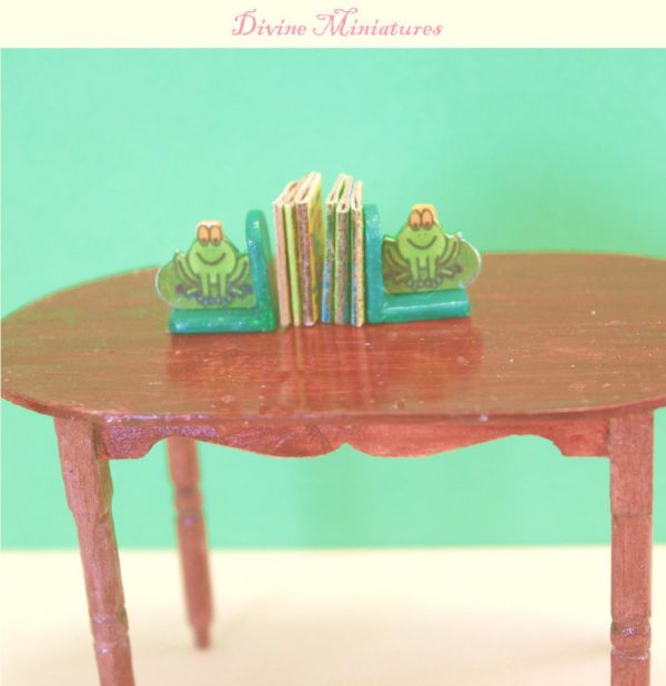 green frog on a lilypad bookend in 1:12 scale dollhouse miniature