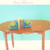 green frog on a lilypad bookend in 1:12 scale dollhouse miniature