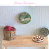 green rustic farmhouse wall clock in 1:12 scale dollhouse miniature