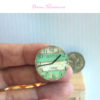 green rustic farmhouse wall clock in 1:12 scale dollhouse miniature