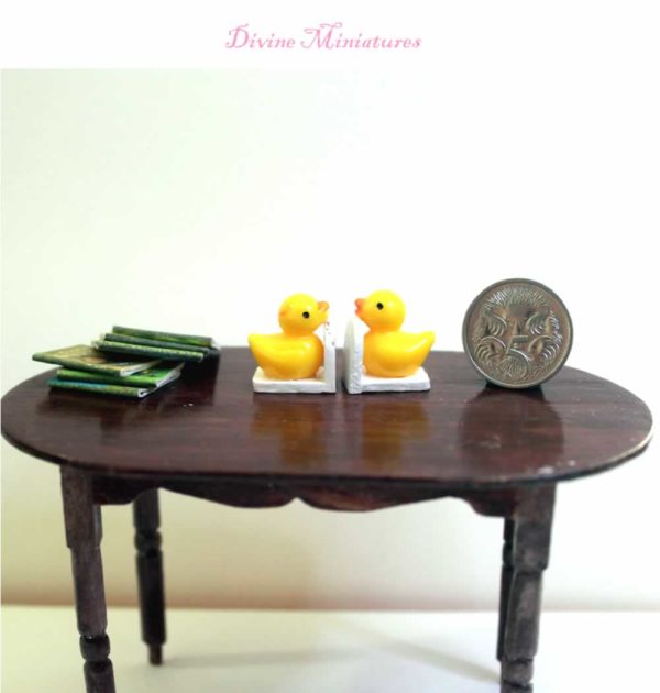 yellow duck nursery bookends with books in 1-12 scale