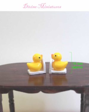 yellow duck nursery bookends with books in 1-12 scale