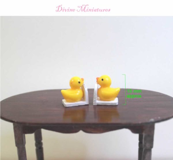 yellow duck nursery bookends with books in 1-12 scale