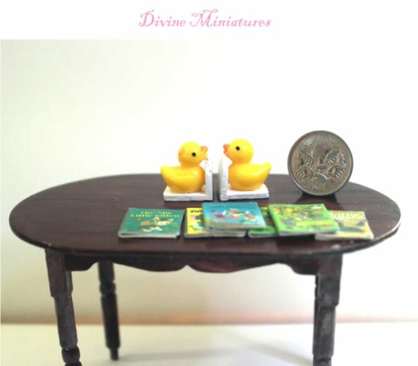 yellow duck nursery bookends with books in 1-12 scale